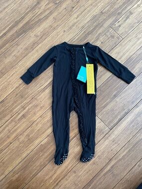 Posh Peanut Black Ribbed Ruffle Footed One-Piece